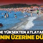 Denizde yüksekten atlayan genç kadının üzerine düştü!