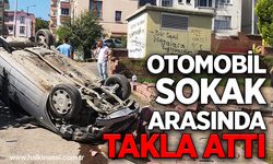 Otomobil sokak arasında takla attı