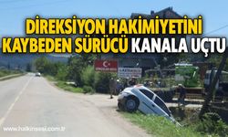 Direksiyon hakimiyetini kaybeden sürücü kanala uçtu