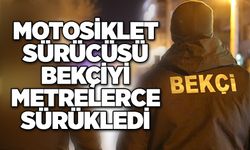 Motosiklet sürücüsü bekçiyi metrelerce sürükledi