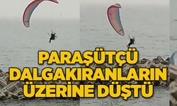 Paraşütçü dalgakıranların üzerine düştü, o anlar kameraya yansıdı