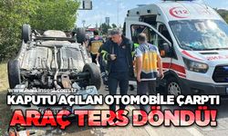 Kaputu açılan otomobile çarptı: Ters dönen aracın sürücüsü yaralandı
