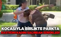 Kocasıyla birlikte parkta bastığı kadını saçından sürükledi