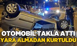 Otomobil takla attı, yara almadan kurtuldu