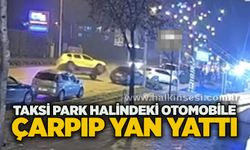 Taksi park halindeki otomobile çarpıp yan yattı