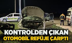 Kontrolden çıkan otomobil refüje çarptı