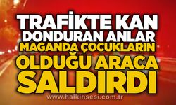 Trafikte kan donduran anlar: Maganda çocukların olduğu araca saldırdı