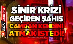 Sinir krizi geçiren şahıs kendini camdan atmak istedi!