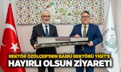 Rektör Özölçer’den BAİBÜ Rektörü Yiğit’e hayırlı olsun ziyareti