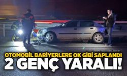 Otomobil bariyerlere ok gibi saplandı: 2 genç yaralı!