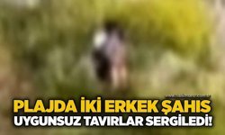 Plajda iki erkek şahıs uygunsuz tavırlar sergiledi!