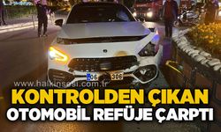 Kontrolden çıkan otomobil refüje çarptı