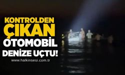 Kontrolden çıkan otomobil çadırların arasından geçip denize uçtu!