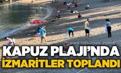 Kapuz Plajı'nda çevre seferberliği: İzmaritler tek tek toplandı