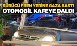 Sürücü fren yerine gaza bastı: Otomobil kafeye daldı