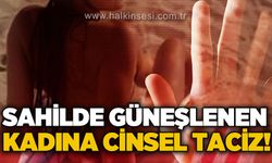 Kumsalda güneşlenen kadına c*nsel taciz!