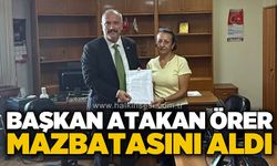 MHP Kilimli İlçe Başkanı Atakan Örer mazbatasını aldı