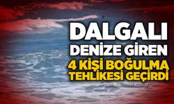 Dalgalı denize giren 4 kişi boğulma tehlikesi geçirdi