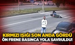 Kırmızı ışığı son anda gördü: Ön frene basınca yola savruldu!