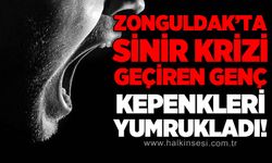 Zonguldak'ta sinir krizi geçiren genç kepenkleri yumrukladı!