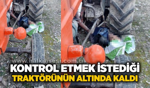Kontrol etmek istediği traktörünün altında kaldı
