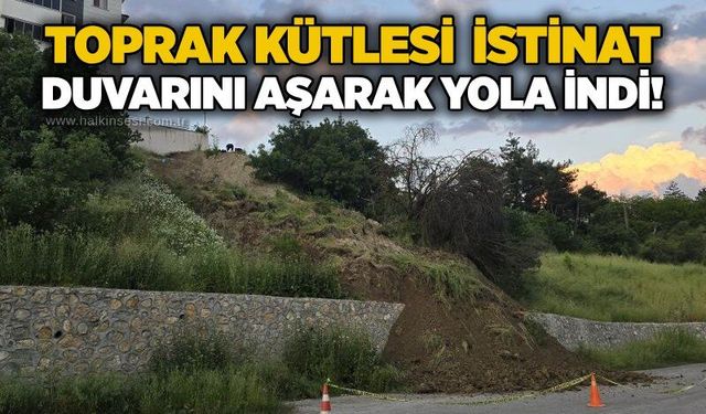 Toprak kütlesi istinat duvarını aşarak yola indi!