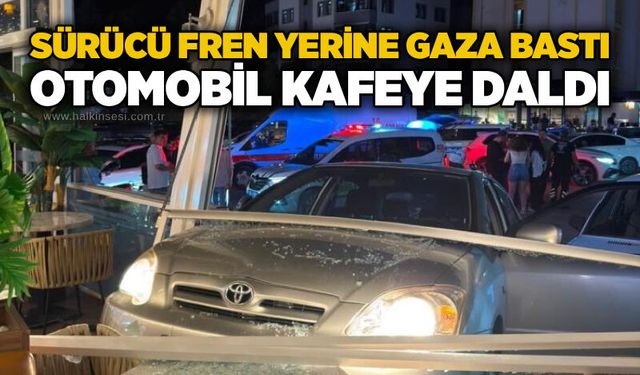 Sürücü fren yerine gaza bastı: Otomobil kafeye daldı