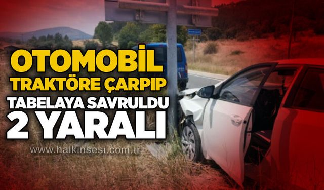 Otomobil traktöre çarpıp tabelaya savruldu: 2 yaralı