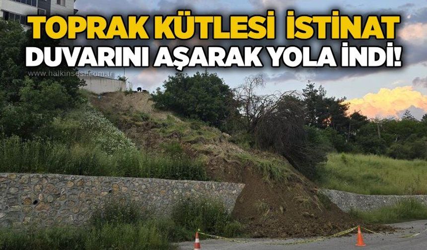 Toprak kütlesi istinat duvarını aşarak yola indi!