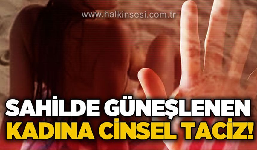 Kumsalda güneşlenen kadına c*nsel taciz!