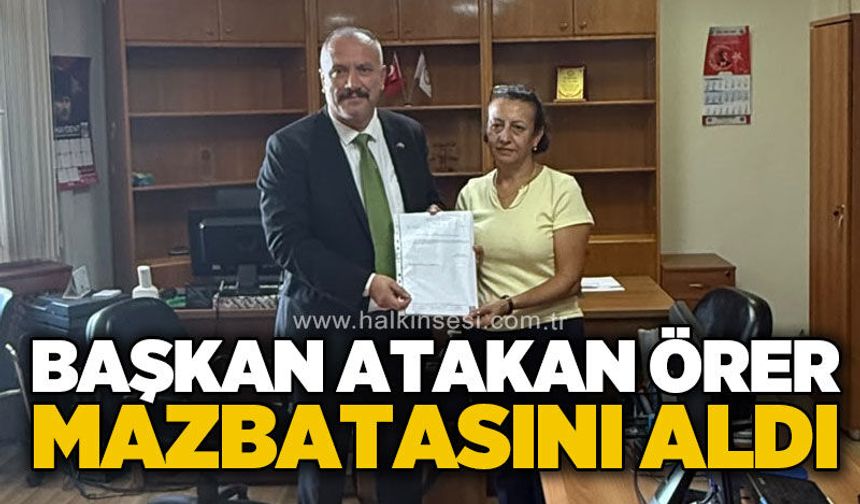 MHP Kilimli İlçe Başkanı Atakan Örer mazbatasını aldı