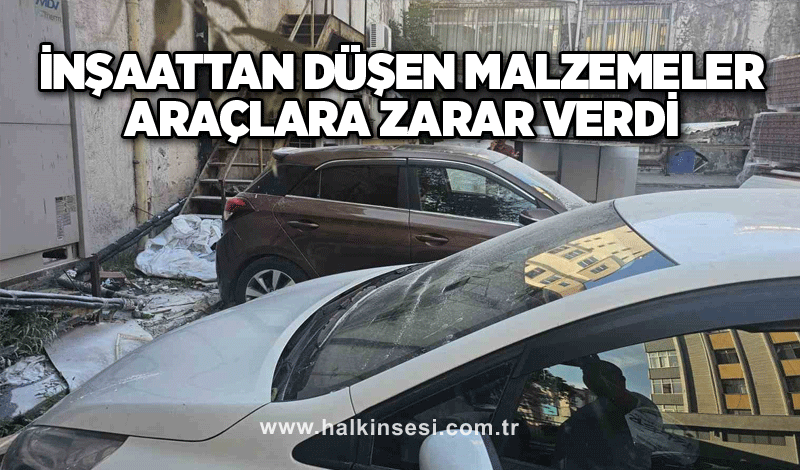 İnşaattan düşen malzemeler araçlara zarar verdi