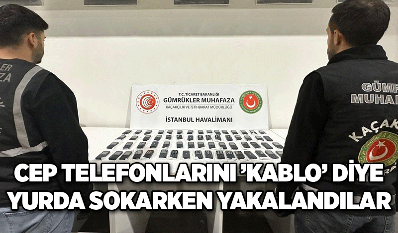 Cep telefonlarını ’kablo’ diye yurda sokarken yakalandılar