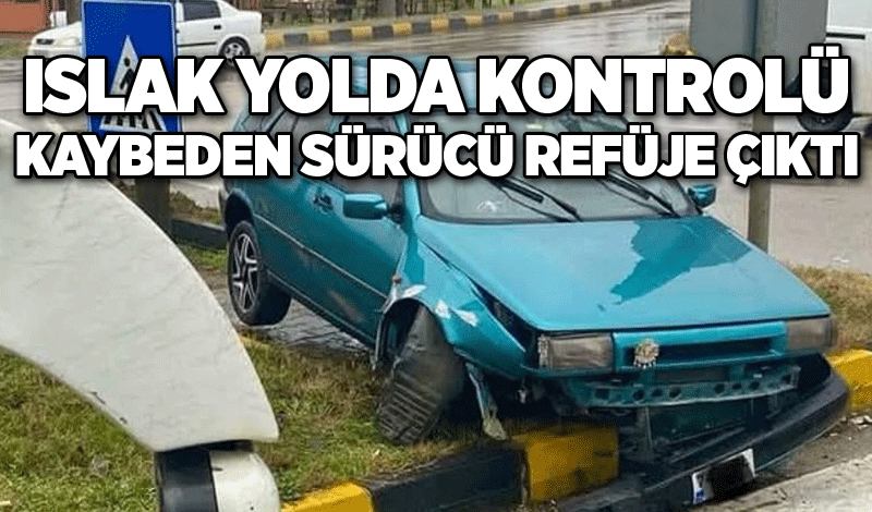 Islak yolda kontrolü kaybeden sürücü refüje çıktı