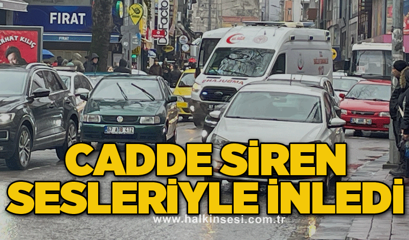 Cadde siren sesleriyle inledi