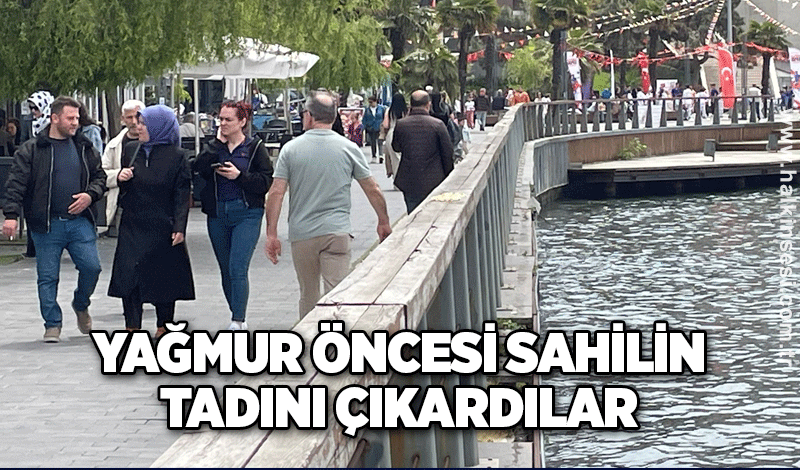 Yağmur öncesi sahilin tadını çıkardılar