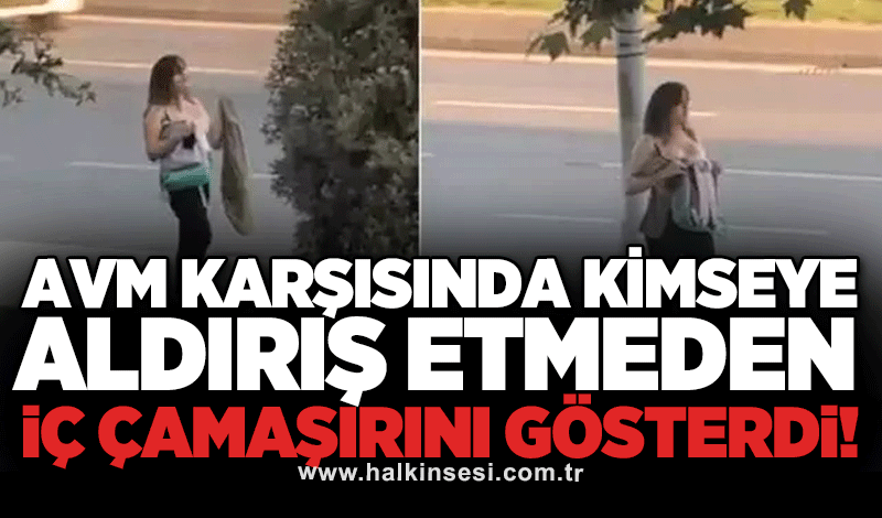 AVM karşısında kimseye aldırış etmeden iç çamaşırını gösterdi: GÜNDÜZ VAKTİ FUHUŞ PAZARLIĞI!