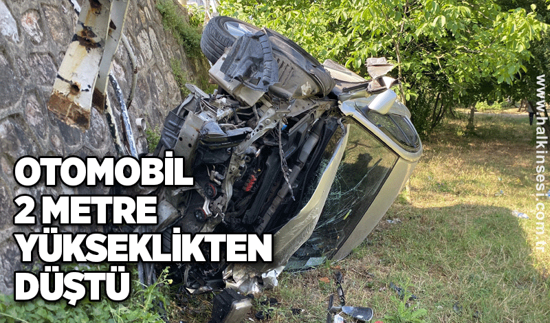 Otomobil 2 metre yükseklikten düştü: Sürücü kazayı yara almadan atlattı