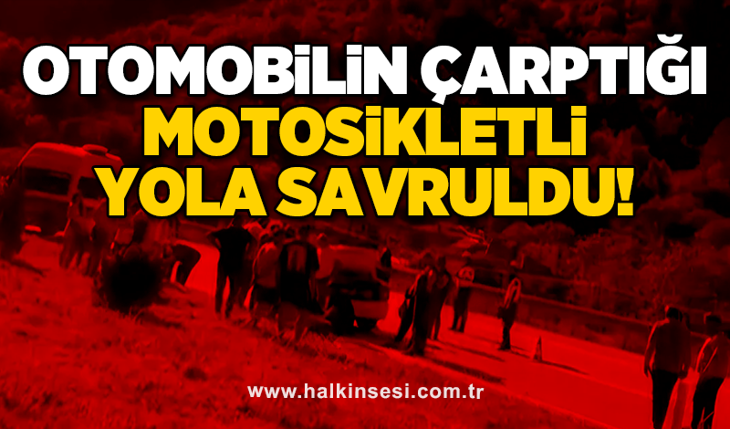 Otomobilin çarptığı motosikletli yola savruldu!